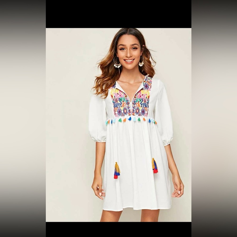 Tie Neck Tassel Detail
Embroidered Tribal Smock
Dress